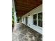 Long covered patio features flagstone, wood ceiling, and recessed lighting at 4101 Brookview Se Dr, Atlanta, GA 30339
