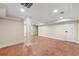 Spacious basement with decorative column and concrete floors, perfect for customization at 1186 Thomas Rd, Decatur, GA 30030