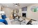 Inviting living room with fireplace, hardwood floors and contemporary furnishings at 1186 Thomas Rd, Decatur, GA 30030