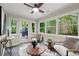 Cozy sunroom filled with natural light and comfortable seating area at 1186 Thomas Rd, Decatur, GA 30030
