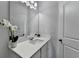 Bathroom with white vanity and storage, plus door for water closet at 3677 Sorrel Ln, Duluth, GA 30096