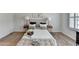 Cozy bedroom displays natural light, tray ceiling, decorative pillows, and matching bedside tables at 3677 Sorrel Ln, Duluth, GA 30096