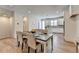 Open dining area with views to the kitchen, island and breakfast bar offering plenty of seating at 3677 Sorrel Ln, Duluth, GA 30096