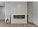 Bright living room showcasing modern fireplace with sleek horizontal shiplap detailing and stylish decor at 3677 Sorrel Ln, Duluth, GA 30096