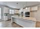 Gourmet kitchen with stainless steel appliances, granite countertops, and a bright sunny view at 3677 Sorrel Ln, Duluth, GA 30096