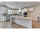 Gourmet kitchen with stainless steel appliances, granite countertops, and a bright sunny view at 3677 Sorrel Ln, Duluth, GA 30096