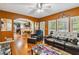 Spacious living room with hardwood floors, fireplace and lots of windows at 3215 Rose Petal Ln, Powder Springs, GA 30127
