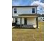 A newly built home with a covered porch in backyard at 4827 Station Lane -Lot 31, Union City, GA 30349