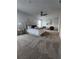 A bright and airy main bedroom with modern furnishings, neutral colors, and a relaxing atmosphere at 4827 Station Lane -Lot 31, Union City, GA 30349