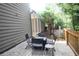Backyard with a patio area and a view of the woods at 1976 Boyd Trace Nw Ln, Atlanta, GA 30318