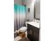 Bathroom features a tub/shower combo and a dark vanity at 1976 Boyd Trace Nw Ln, Atlanta, GA 30318