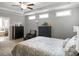 This bedroom features carpet, a ceiling fan, and neutral paint at 1976 Boyd Trace Nw Ln, Atlanta, GA 30318