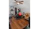 Bright bonus room with exercise equipment, a comfortable seating area, and hardwood floors at 1976 Boyd Trace Nw Ln, Atlanta, GA 30318