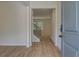 Entryway showcases beautiful flooring leading to the staircase with decorative railings at 1129 Georgian Point Dr, Lawrenceville, GA 30045