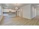 Spacious kitchen with ample countertop space and a view of the living area at 1129 Georgian Point Dr, Lawrenceville, GA 30045