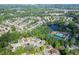 Aerial view highlights home in a verdant community, near a lake and amenities at 1641 Rocky Knoll Ln, Dacula, GA 30019