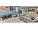 Basement area with seating, kitchenette, and views into other flexible spaces at 1641 Rocky Knoll Ln, Dacula, GA 30019