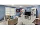 Cozy basement living area with plush seating and ample natural light at 1641 Rocky Knoll Ln, Dacula, GA 30019
