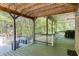 Covered deck space with a grill and wooded views, perfect for outdoor cooking at 1641 Rocky Knoll Ln, Dacula, GA 30019