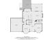 Detailed floor plan of the first floor, showcasing layout with kitchen, living spaces, and garage at 1641 Rocky Knoll Ln, Dacula, GA 30019