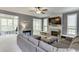 Cozy living room with a fireplace, comfortable seating, and ample natural light at 1641 Rocky Knoll Ln, Dacula, GA 30019