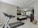 Open bedroom layout featuring carpet, neutral paint, and modern ceiling fan at 1641 Rocky Knoll Ln, Dacula, GA 30019