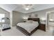 Main bedroom features neutral walls, a ceiling fan, and carpet flooring at 1641 Rocky Knoll Ln, Dacula, GA 30019