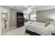 Spacious main bedroom featuring a ceiling fan, carpet, and neutral paint at 1641 Rocky Knoll Ln, Dacula, GA 30019