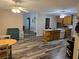 Open kitchen featuring an island, wooden cabinets, and modern appliances, perfect for cooking and entertaining at 4045 Fawn Valley Dr, Loganville, GA 30052