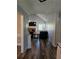 Inviting living room with vaulted ceiling, brick fireplace, and modern flooring at 4045 Fawn Valley Dr, Loganville, GA 30052
