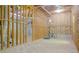 Unfinished basement showing exposed framing and ductwork, and ample space for storage or recreation at 1166 Memory Ln, Lawrenceville, GA 30044