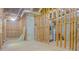 Unfinished basement with exposed framing and ductwork, offering potential for customization at 1166 Memory Ln, Lawrenceville, GA 30044