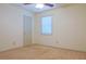 Bedroom featuring a ceiling fan, neutral walls, and a window for natural lighting at 1166 Memory Ln, Lawrenceville, GA 30044