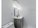 Clean bathroom featuring a gray vanity, modern faucet, and a bright overhead light at 1292 Eubanks Ave, Atlanta, GA 30344