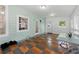 Bonus room featuring several windows, a back door, and mixed tile flooring at 1292 Eubanks Ave, Atlanta, GA 30344