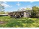 Charming backyard features a deck and lush landscaping at 2218 Edgemore Se Dr, Atlanta, GA 30316