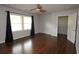 Bedroom with hardwood floors, a ceiling fan, walk-in closet and plenty of natural light at 2218 Edgemore Se Dr, Atlanta, GA 30316