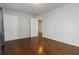 Bright bedroom with hardwood floors, neutral walls and entry doors at 2218 Edgemore Se Dr, Atlanta, GA 30316