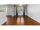 Spacious living room with wood floors, large windows, and neutral paint at 2218 Edgemore Se Dr, Atlanta, GA 30316