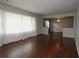 Open living room with hardwood floors, soft natural light, and an open floor plan perfect for entertaining at 2218 Edgemore Se Dr, Atlanta, GA 30316