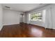 Bright living room featuring hardwood floors, large windows, and neutral paint at 2218 Edgemore Se Dr, Atlanta, GA 30316