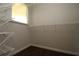 Walk-in closet features wire shelving and a window at 2218 Edgemore Se Dr, Atlanta, GA 30316