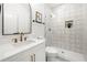 Modern bathroom featuring sleek fixtures, a glass enclosed shower, and minimalist design at 224 Cambridge Ave, Decatur, GA 30030