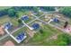 Serene aerial view of home neighborhood, showcasing sprawling lawns, custom homes, and tranquil streets at 86 Ewing Way, Dacula, GA 30019