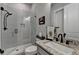 Beautiful bathroom featuring a glass-enclosed shower and granite countertops at 86 Ewing Way, Dacula, GA 30019