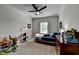 Comfortable bedroom with a ceiling fan and plenty of natural light at 86 Ewing Way, Dacula, GA 30019