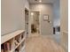 Hallway with hardwood floors leading to a view of the bathroom at 86 Ewing Way, Dacula, GA 30019