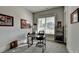 Home office space with natural light and neutral décor, ready for productivity at 86 Ewing Way, Dacula, GA 30019