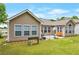 Inviting backyard showcasing a charming patio and verdant lawn, perfect for outdoor enjoyment at 2416 Centennial Hill Nw Way, Acworth, GA 30102