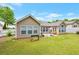 Home featuring a flat backyard with a patio at 2416 Centennial Hill Nw Way, Acworth, GA 30102